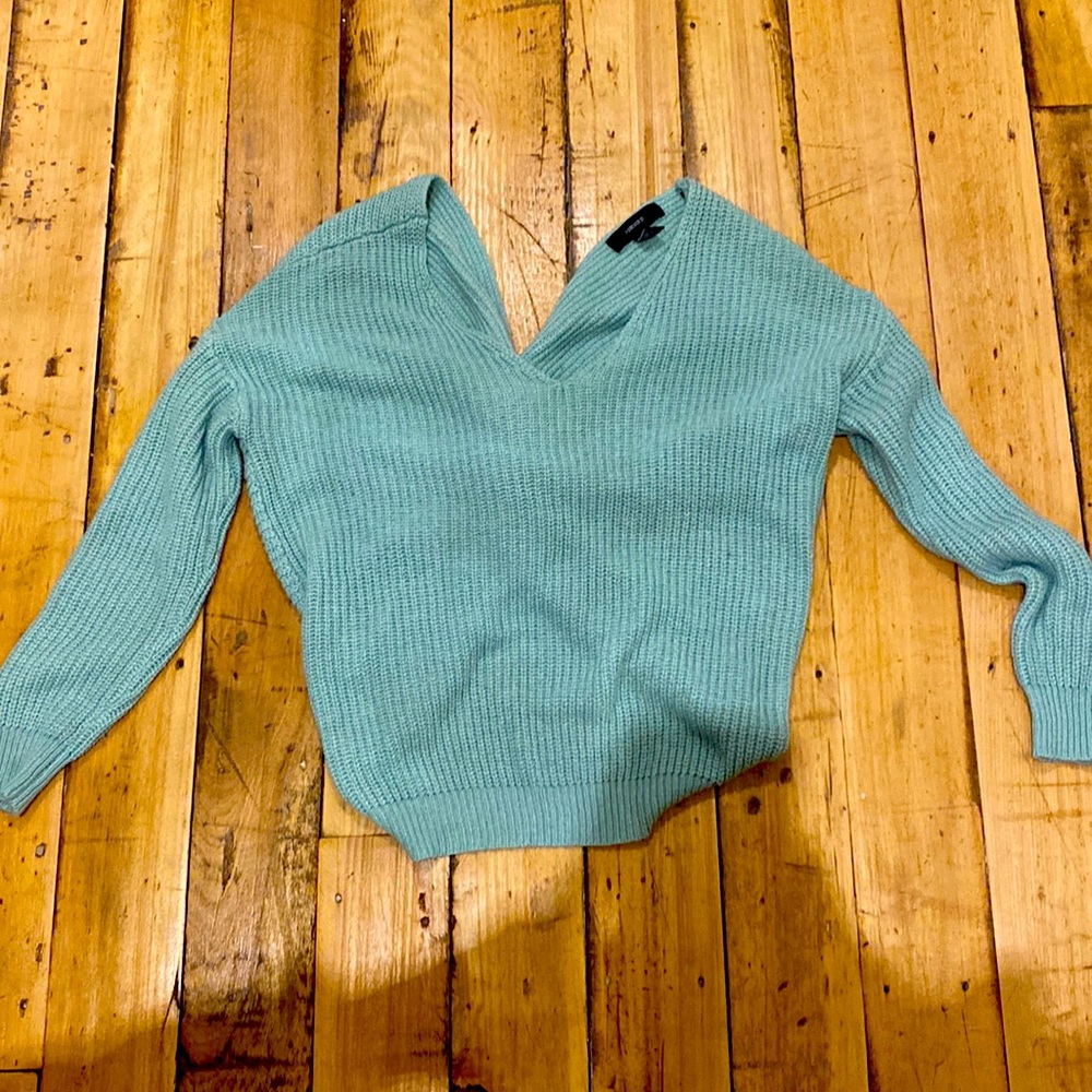 Mint green sweater with open back